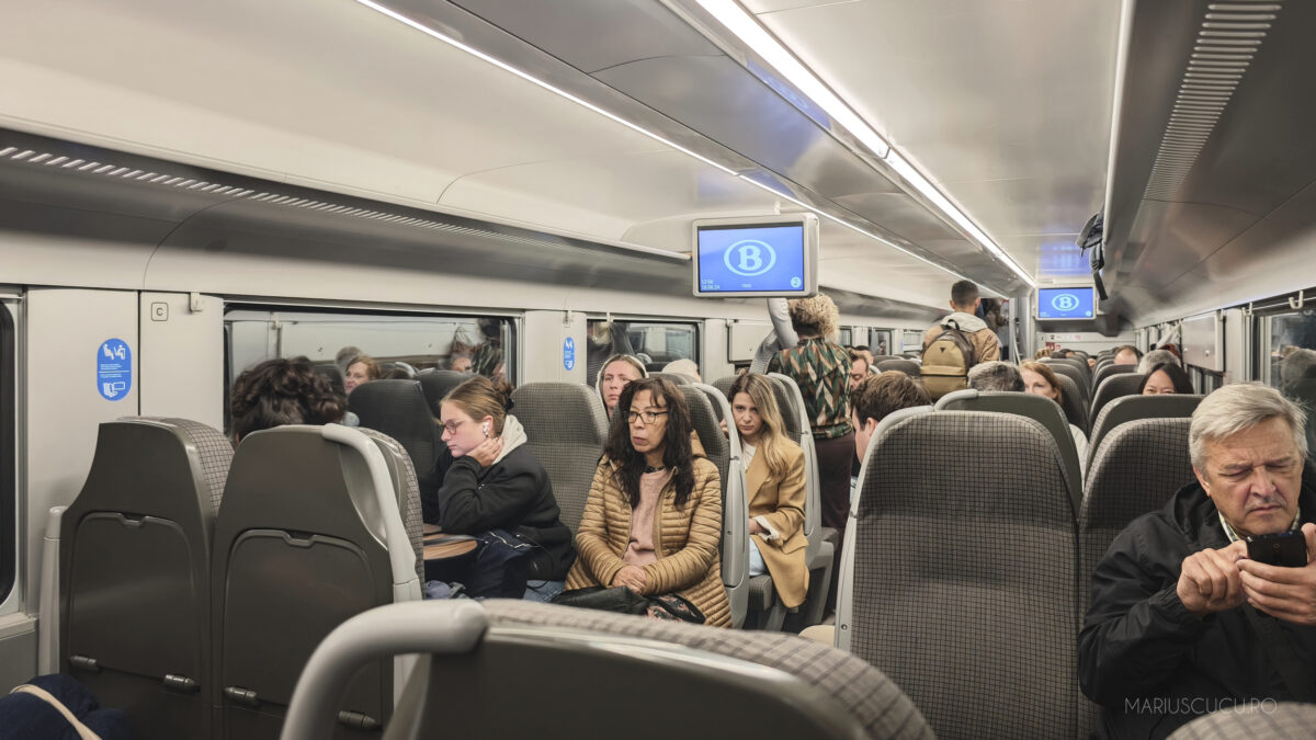 oameni tren belgia